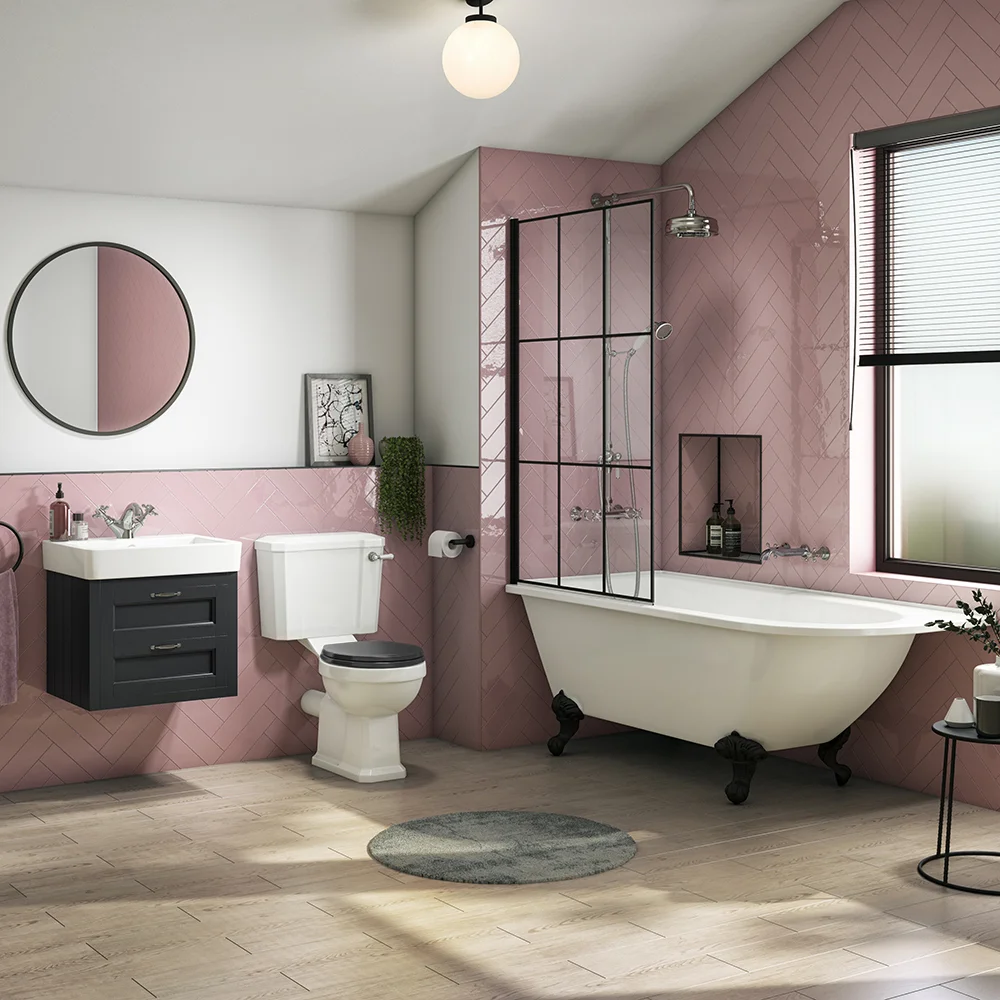 Traditional pink bathroom suite with roll-top bath