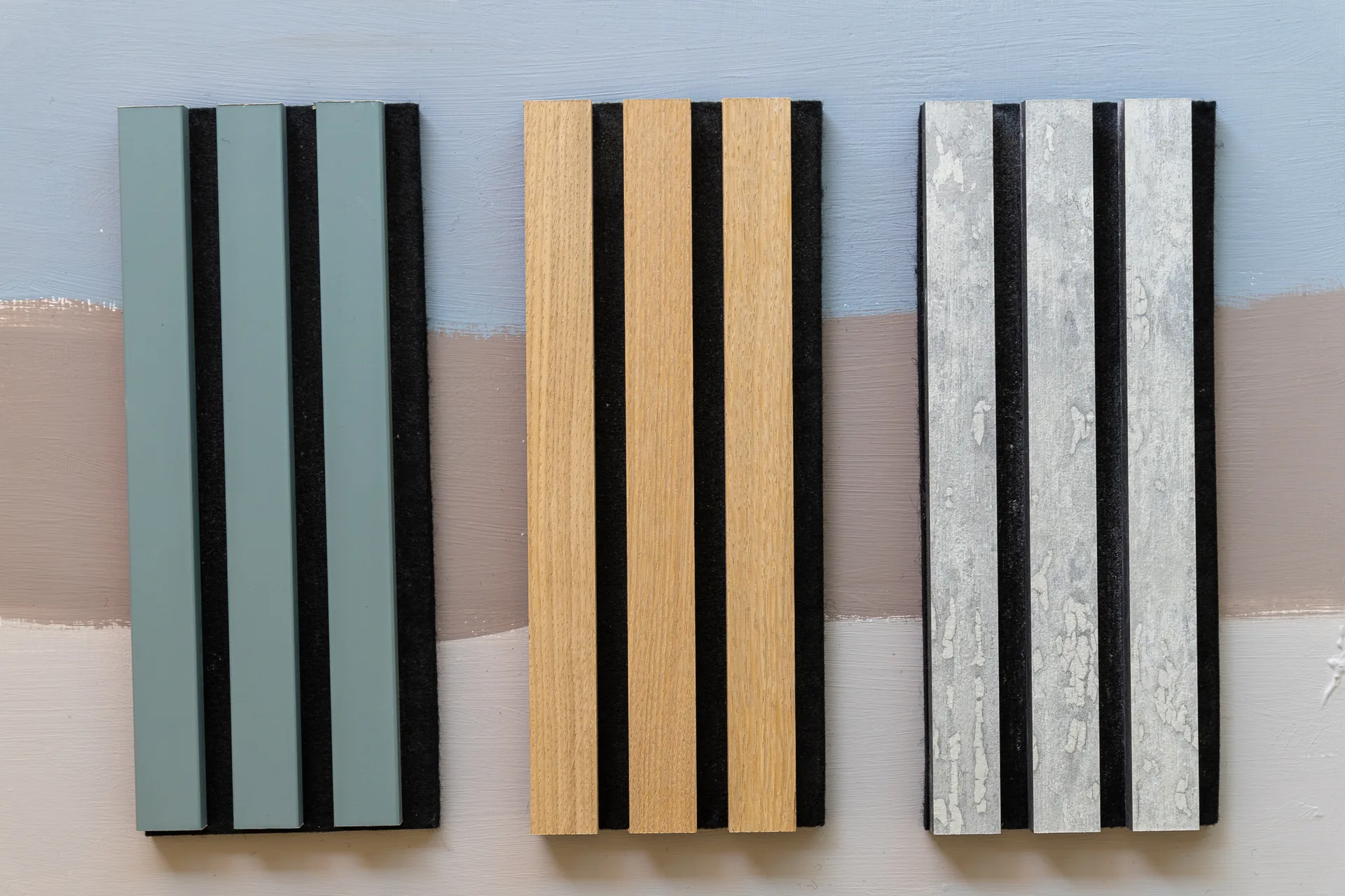 Slat panel samples in sage, oak and concrete finishes