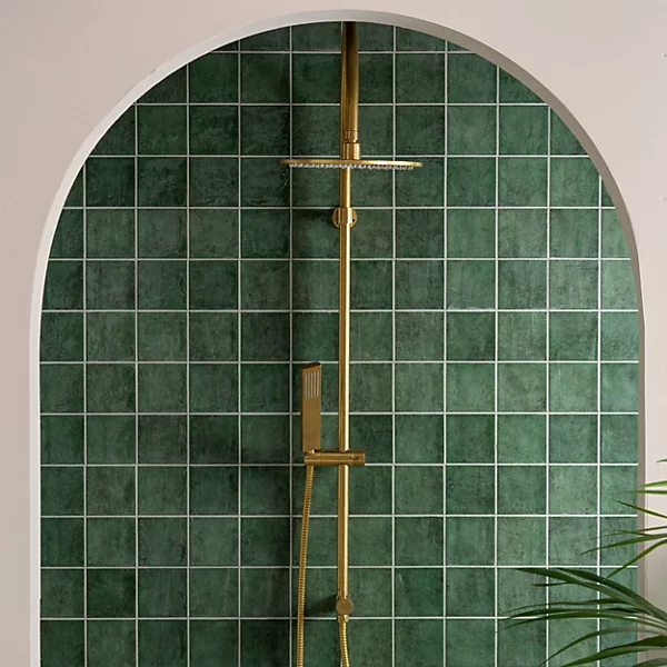 Green zellige-style wall tiles